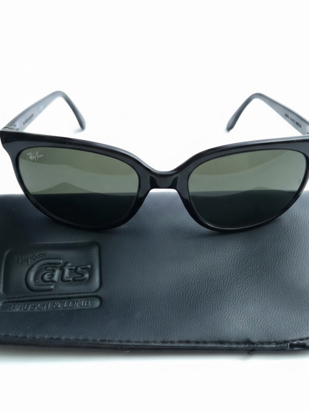 Authentic vintage 1980s Bausch & Lomb Ray-Ban "Cats" sunglasses in glossy black